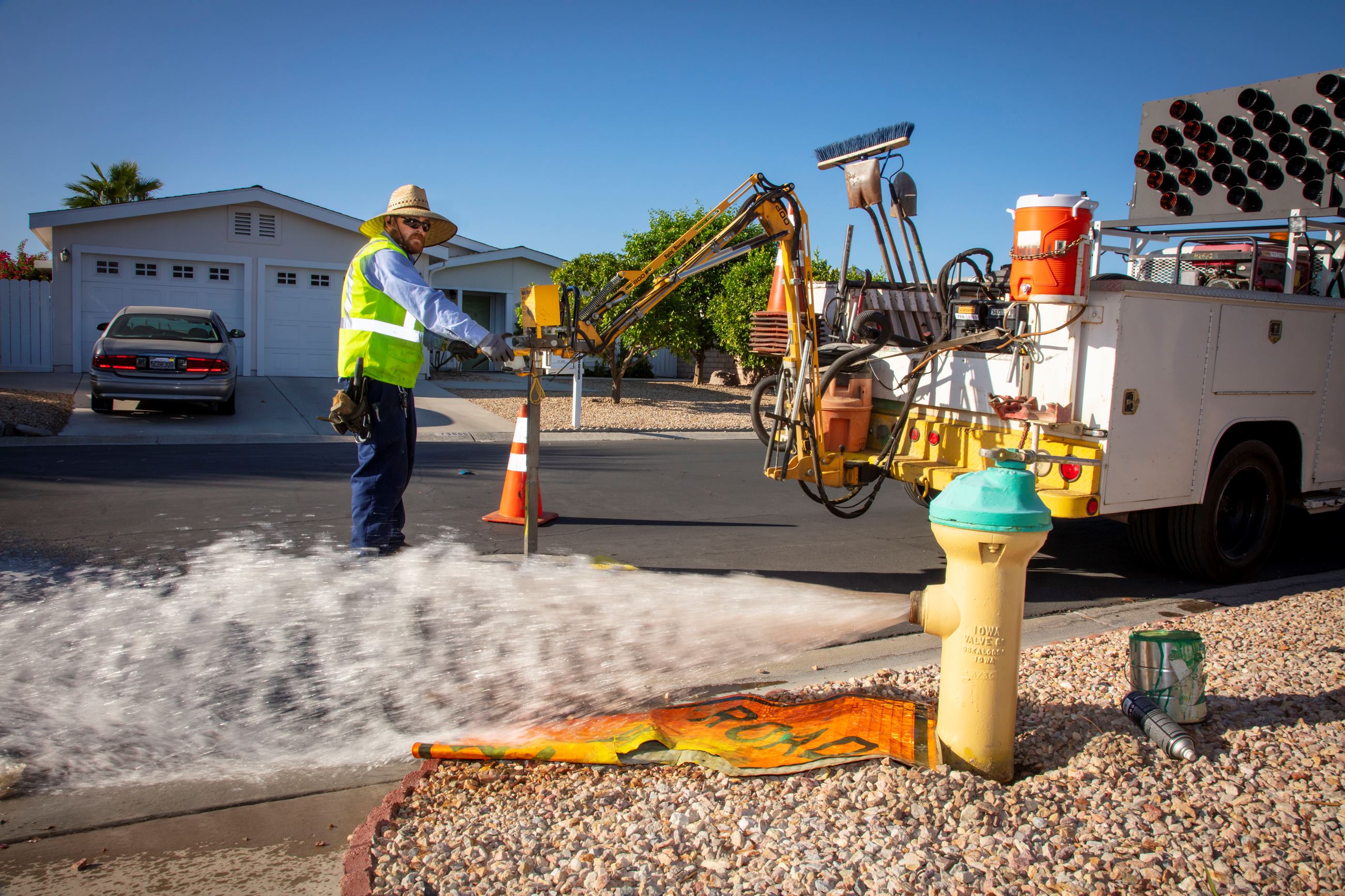 Fire hydrant being flushed for maintenance by CVWD employee